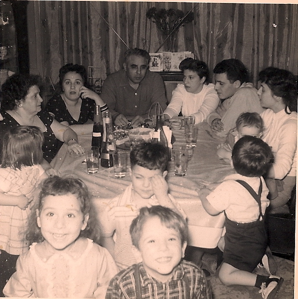 At "Auntie's" with the family. Me & cousin Steven in foreground raising hell