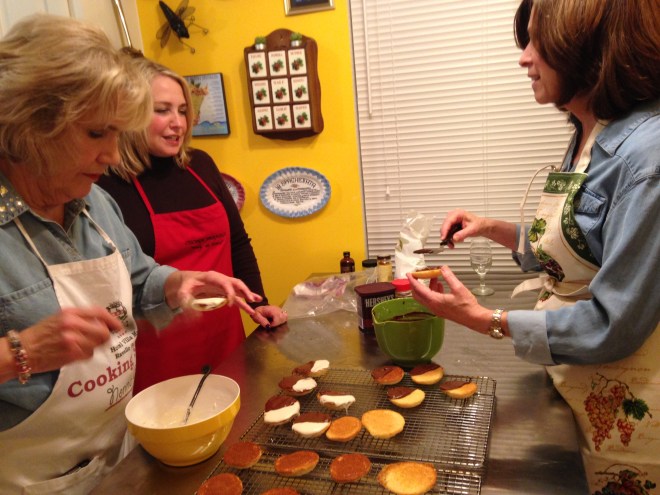 icing the black and white cakes in class