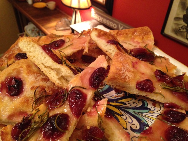 grape pizza cut into pieces