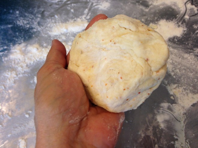 I barely knead it. Just push together to stick and pat into a thick disk.